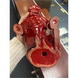 Royal Doulton Flambe figure of a Bulldog, modelled seated, model no 135, with printed maker's mark and K and impressed 135 beneath, H13.5cm