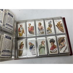 Four modern loose leaf albums containing a large quantity of cigarette and trade cards by Stephen Mitchell, Carreras, Churchman, Players, Wills, Brooke Bond, Gallahers, Ogdens, Whitbread etc including military, railway, natural history, naval, general knowledge etc (4)