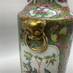 19th century Chinese Canton famille rose vase, converted to a table lamp, of shouldered cylindrical form, with twin gilt lion mask ring handles, the body decorated with four alternating panels of figural scenes and birds and insects, H31cm excluding fitting