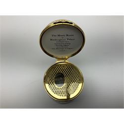 Cylindrical music box with domed lid depicting the Music Room at Buckingham Palace and playing Mozart's 'Voi Che Sapete', limited edition 187 of 250, boxed, together with enamel box for the silver jubilee and a victorian paperweight of Scarbrough  