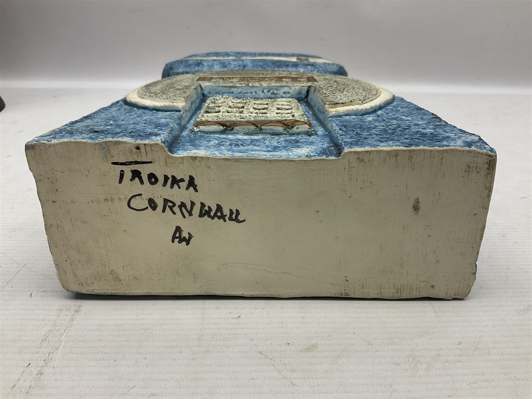 Large Troika double base vase, decorated with geometric design upon a blue ground, designed by Annette Walters, with painted marks beneath, H36cm  