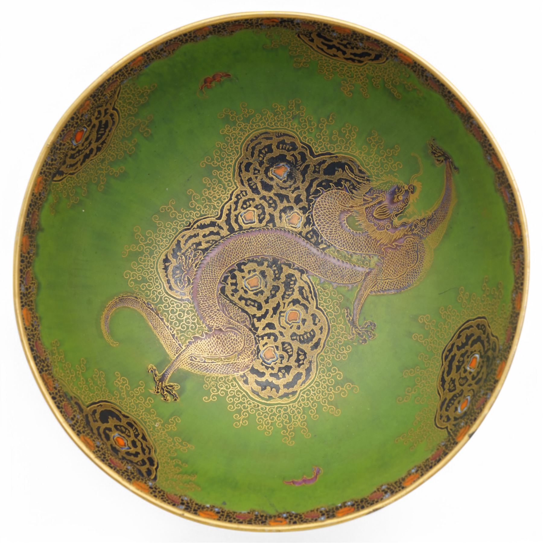 Carlton Ware bowl on stand decorated with Oriental dragon on a green and gilt ground D24cm