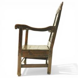 17th century Carolean oak Wainscot chair, the pokerwork cresting rail with carved geometric decoration, over a foliate carved back panel with arcade carved uprights, the arms with repeating guilloche carvings, raised on square chamfered supports united by castors