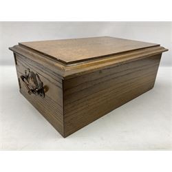 Early 20th century Art Nouveau oak canteen of rectangular form, the hinged top with central inlaid brass cartouche engraved with North Eastern Railway Company interest, 1917, with hinged lift up lid revealing fitted interior, above two drawers, with twin handles, L47cm H19cm D32cm
with key 