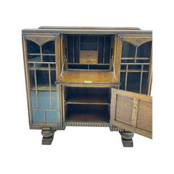 Early 20th century oak side-by-side bureau bookcase, fall front over drawer and cupboard, flanked by two glazed doors