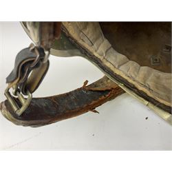 Early 20th century French mounted gendarme's helmet, brass with nickel-silver mountings, broad band embossed with fused grenade, high comb with the face of the gorgon Medusa at the peak and with a black horse hair crest, plume socket at the left, leather-backed nickel-silver chin scales with lion mask mounts.