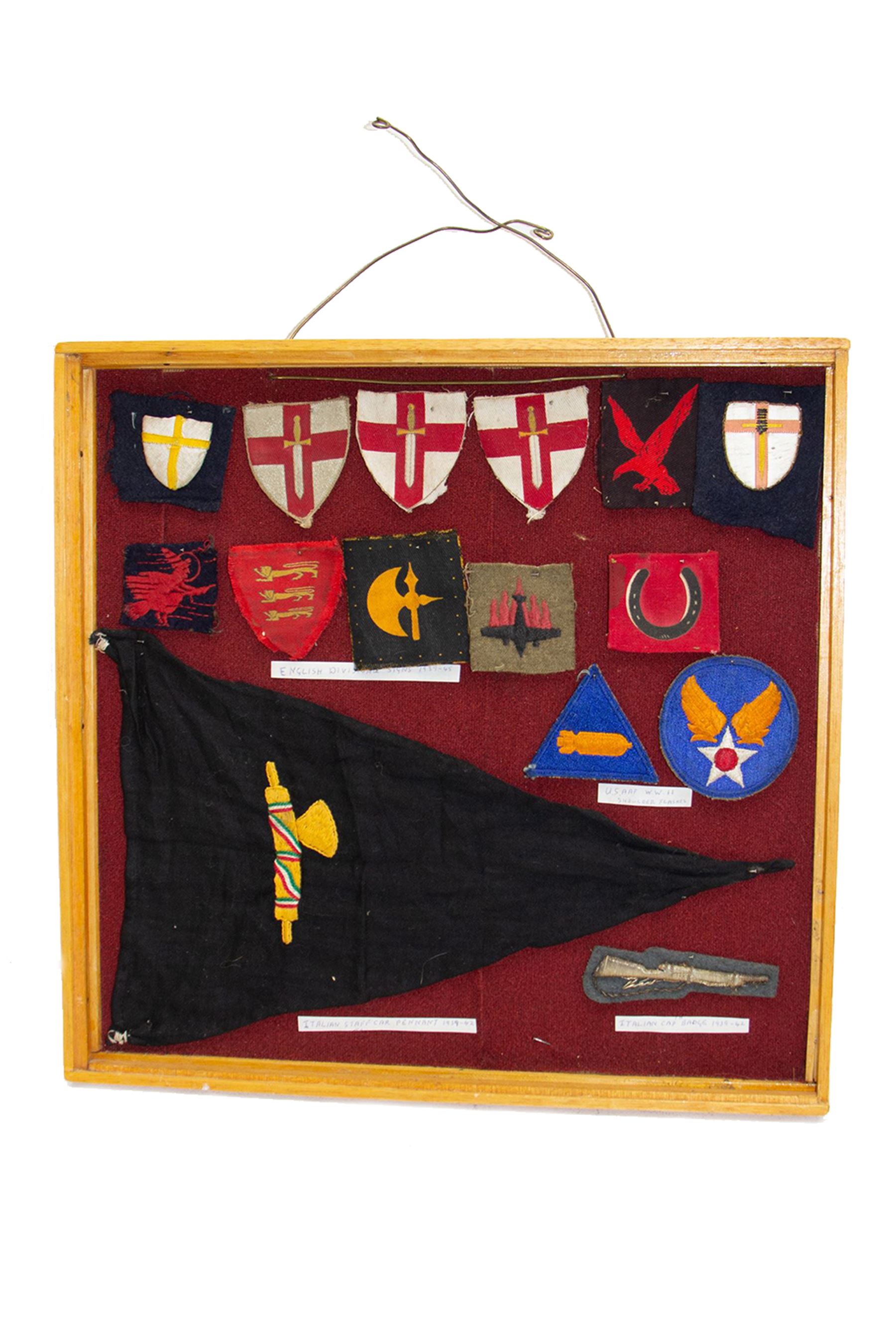 Fifteen WWII insignia cloth badges, including Channel Islands Liberation Force, 13th Infantry Division, British 78th infantry, 1st Army formation sign, USAAF WWII shoulder flashes, etc, all within a framed display H36cm,  W37cm   
