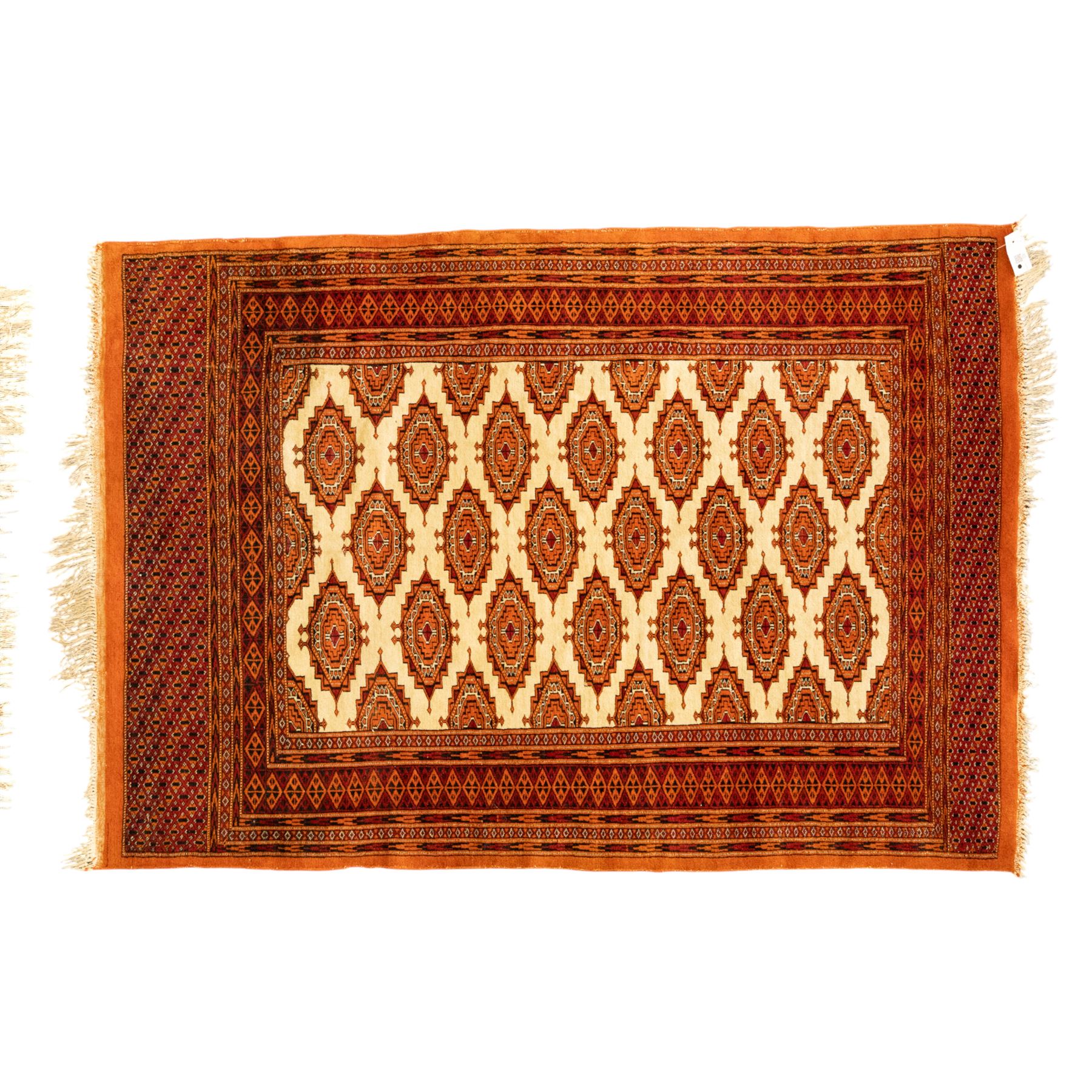 Three rugs,  comprising a Baluch rug in crimson ground, 179x97cm, a Tekke Bokhara rug in crimson ground, 201x132cm, and a Bokhara rug in ochre ground, 125x175cm 