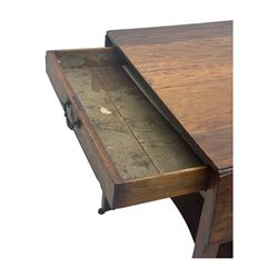 Georgian design mahogany drop-leaf table, rectangular top above a single drawer with brass handle, square supports united by arched undertier, on brass castors (W62cm, D65cm, H72cm); and a smaller mahogany drop-leaf table with single drawer on turned supports (W43cm, D61cm, H72cm)