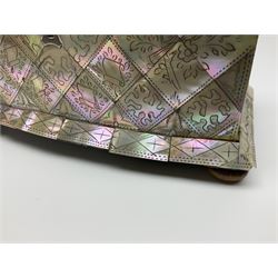 Victorian mother of pearl tea caddy, of rectangular bow-fronted form, the body with floral, bird and geometric engraved mother of pearl panels, white metal shield plaque to the cover inscribed with the initials G.J.A and similar escutcheon, the two division interior with ivory edging and two panelled mother of pearl lids, on four vegetable ivory bun feet L20cm, together with a similar style mother of pearl card case (2) This item has been registered for sale under Section 10 of the APHA Ivory Act