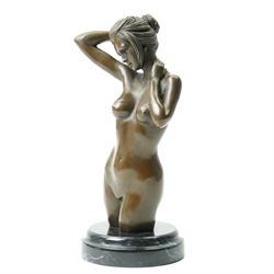 Bronze of a nude female torso, signed nick, on black marble base, H25cm