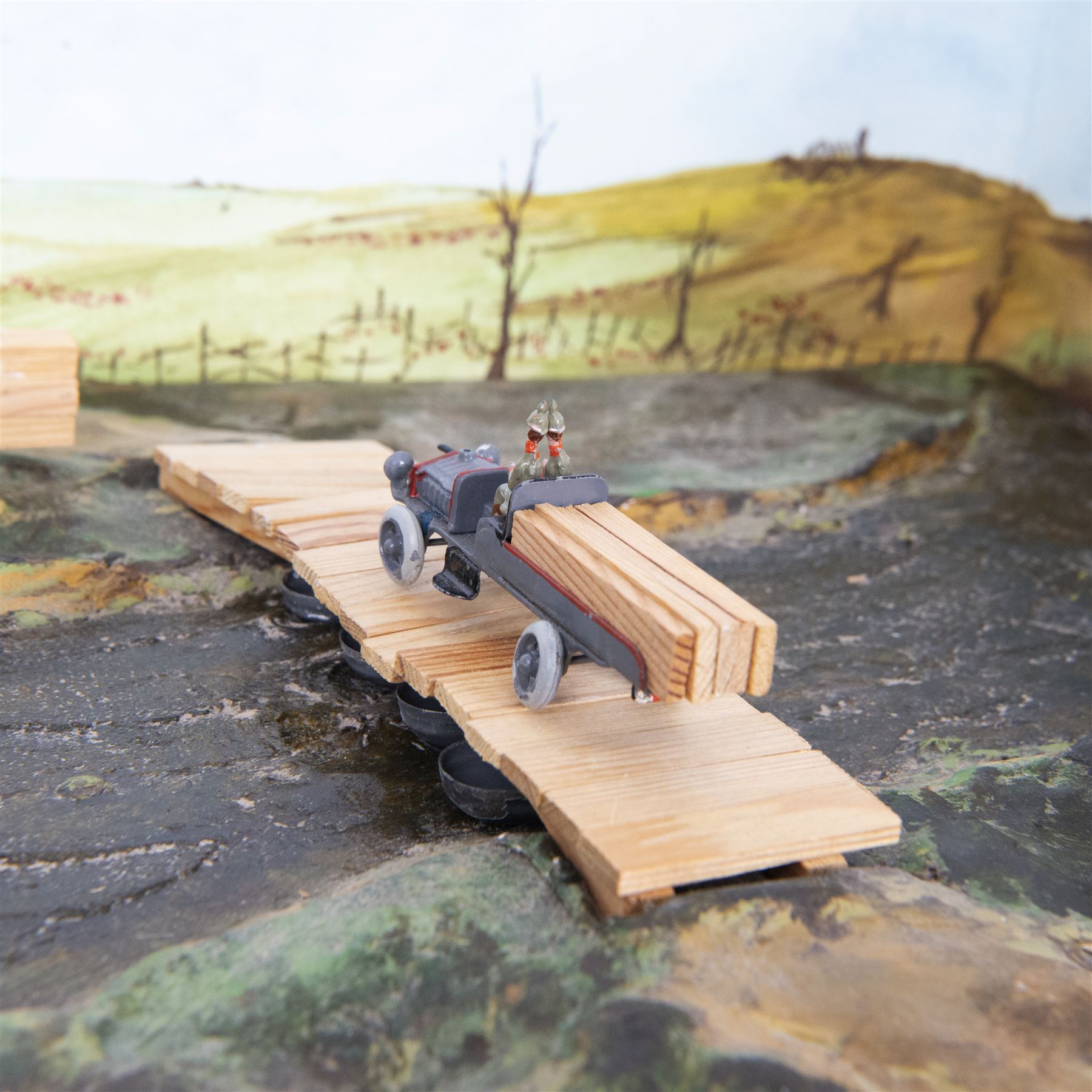 Ernst Plank; Pontoon diorama, with three wagons, pontoon boats, wooden planks and joints with all passengers and drivers, circa 1912, diorama is displayed in book Ernest Plank Miniatures; Vehicles, Transport Toys & Accessories by Jeff Carpenter pages 29 and 30  