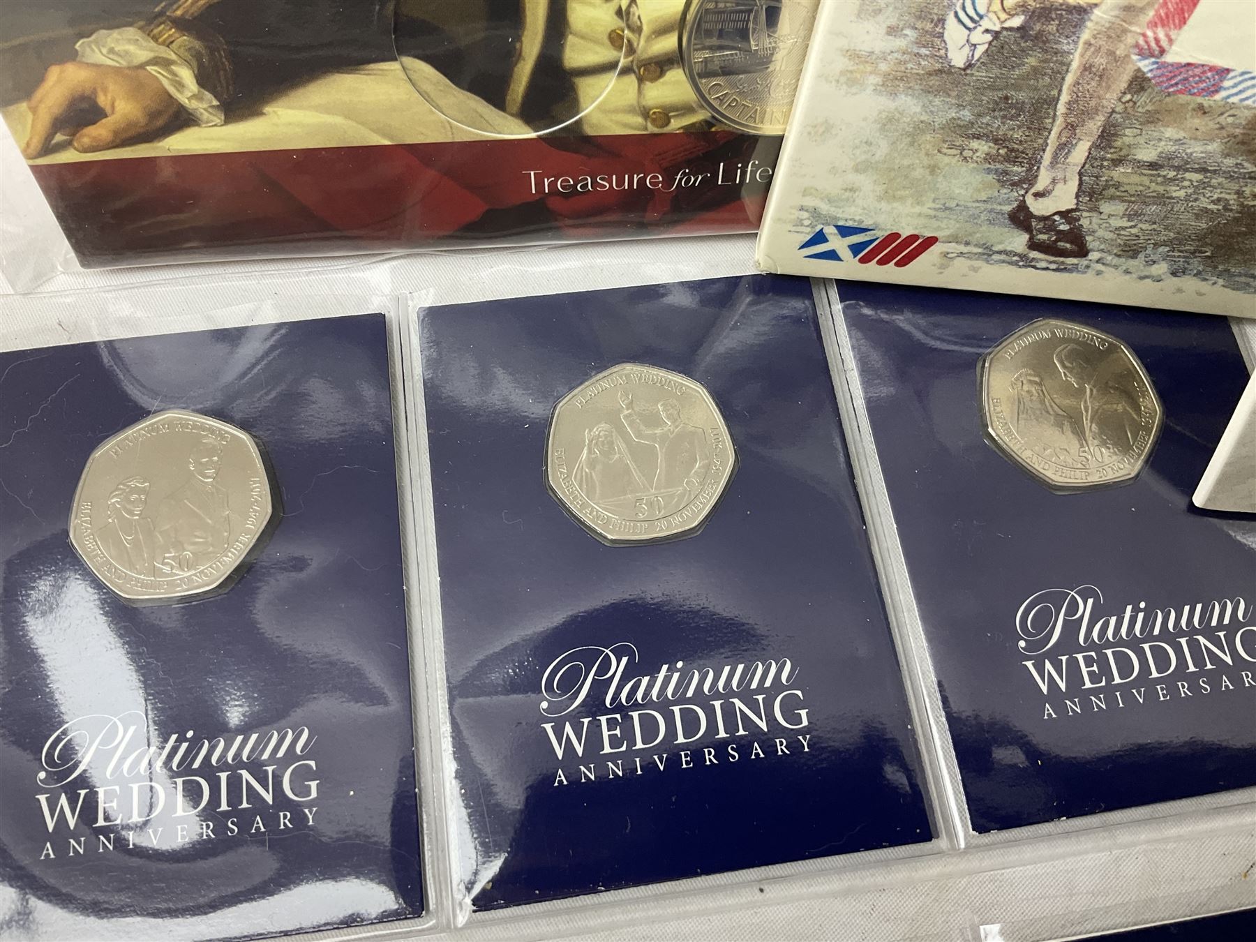 Great British and World coins, including two The Royal Mint Experience 2018 Sir Isaac Newton fifty pence coins on cards, commemorative crowns, Queen Elizabeth II 1999 five pounds, pre-decimal coinage, various Isle of Man fifty pence pieces etc