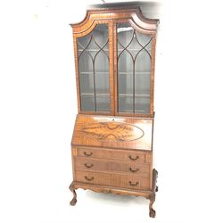 Early 20th century mahogany bureau bookcase, two glazed doors, single fall front enclosing fitted interior above three graduating drawers, ball and claw feet