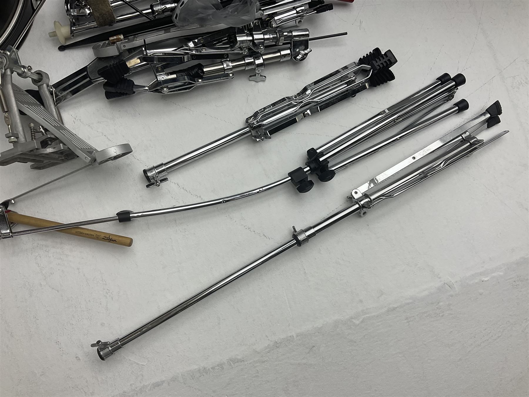 Rockburn eight-piece black drum kit with bass drum, floor tom and five other toms and snare drum; together with two other snare drums; Haosen bass drum; four cymbals; various stands, foot pedals, stool, tri-angle, drum sticks etc