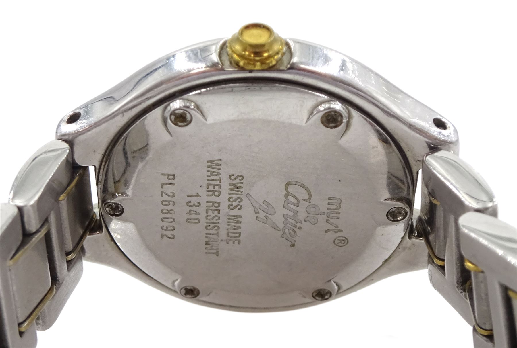 Must De Cartier 21 ladies bi-metal stainless steel quartz wristwatch, Ref. 1340, silvered dial with an inner minute track and Roman numeral bezel, on integrated bi-metal bracelet