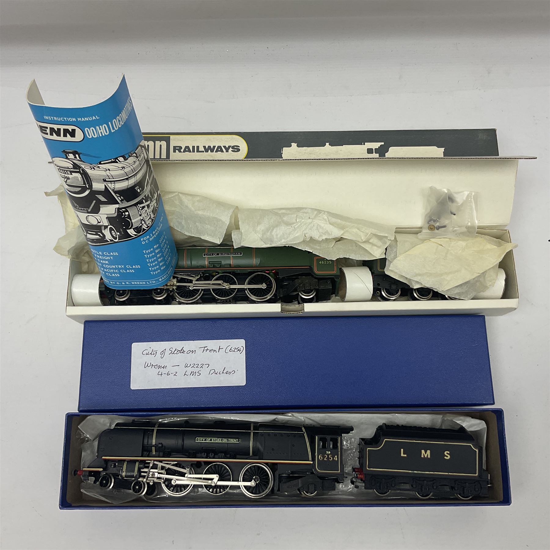 Wrenn '00' gauge - two Princess Coronation (Duchess Class) 4-6-2 locomotives - 'City of Birmingham' No.46235 in BR Green; boxed with tender and instructions; and 'City of Stoke-on-Trent' No.6254 in LMS lined black with associated plain blue box (2)