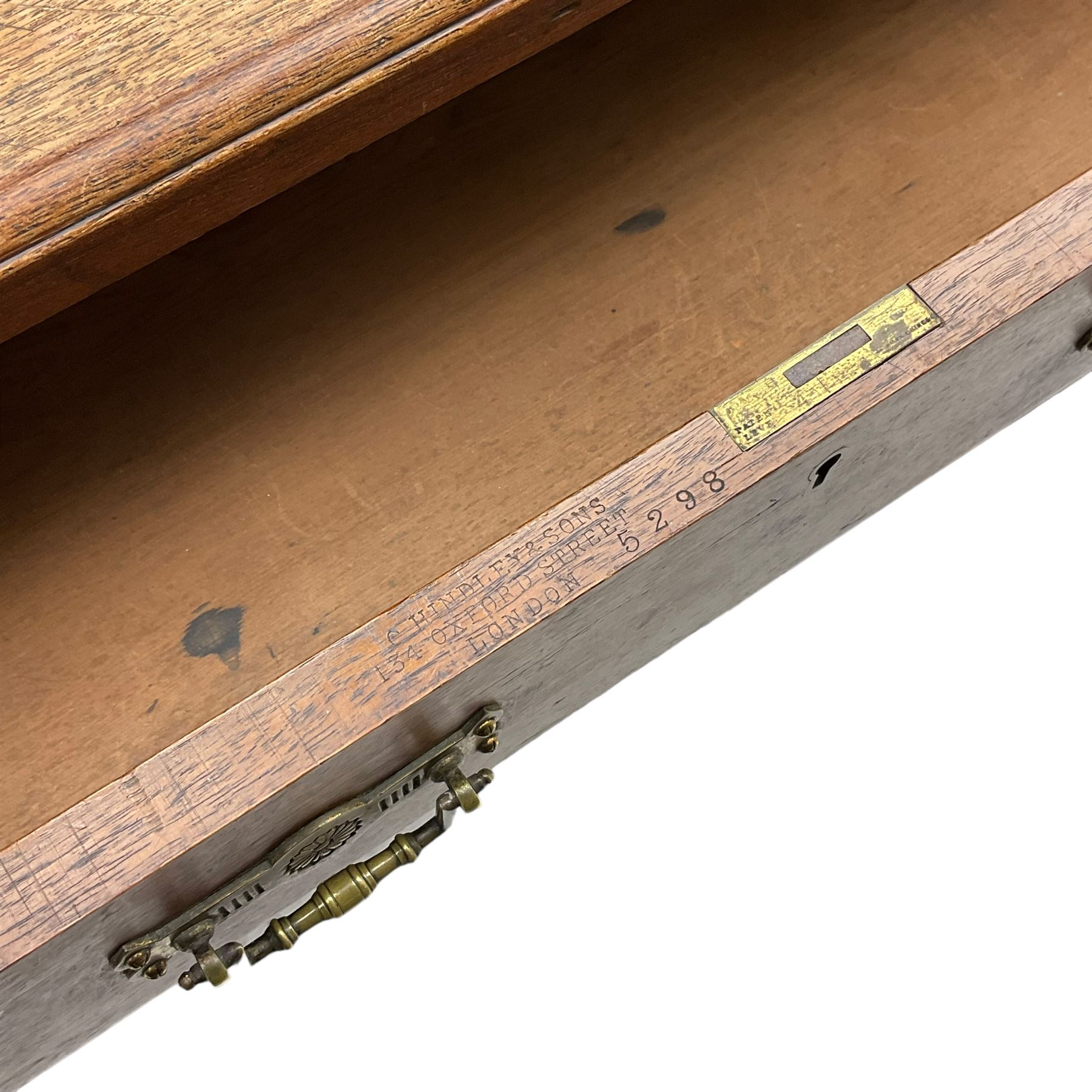 C. Hindley & Sons (London: 1820-1892) - Late Victorian walnut twin pedestal desk, the rectangular moulded top surmounted by two banks of two drawers over eleven graduating drawers, on moulded plinth base, the central drawer stamped 'C. Hindley & Sons, 134 Oxford Street, London, 5298'