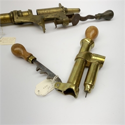 Two 19th century brass 12-bore cartridge making tools comprising bench mounting Bartram & Co Patent 'Nimrod' re-loader and J.C. Cocker Patent 5535 redecapper with turned wooden rammer (2)