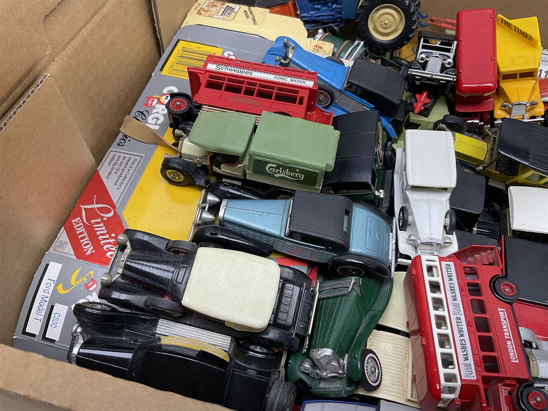 Over fifty modern die-cast models, predominantly Matchbox, including cars, promotional  and commercial vehicles; and a quantity of flat-packed model boxes