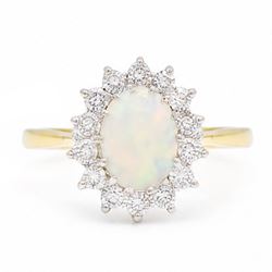 18ct gold opal and diamond cluster ring, single oval cabochon cut opal, surrounded by four...