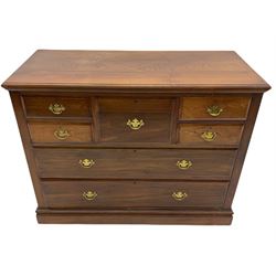 Edwardian walnut chest, moulded rectangular top over seven drawers, plinth base