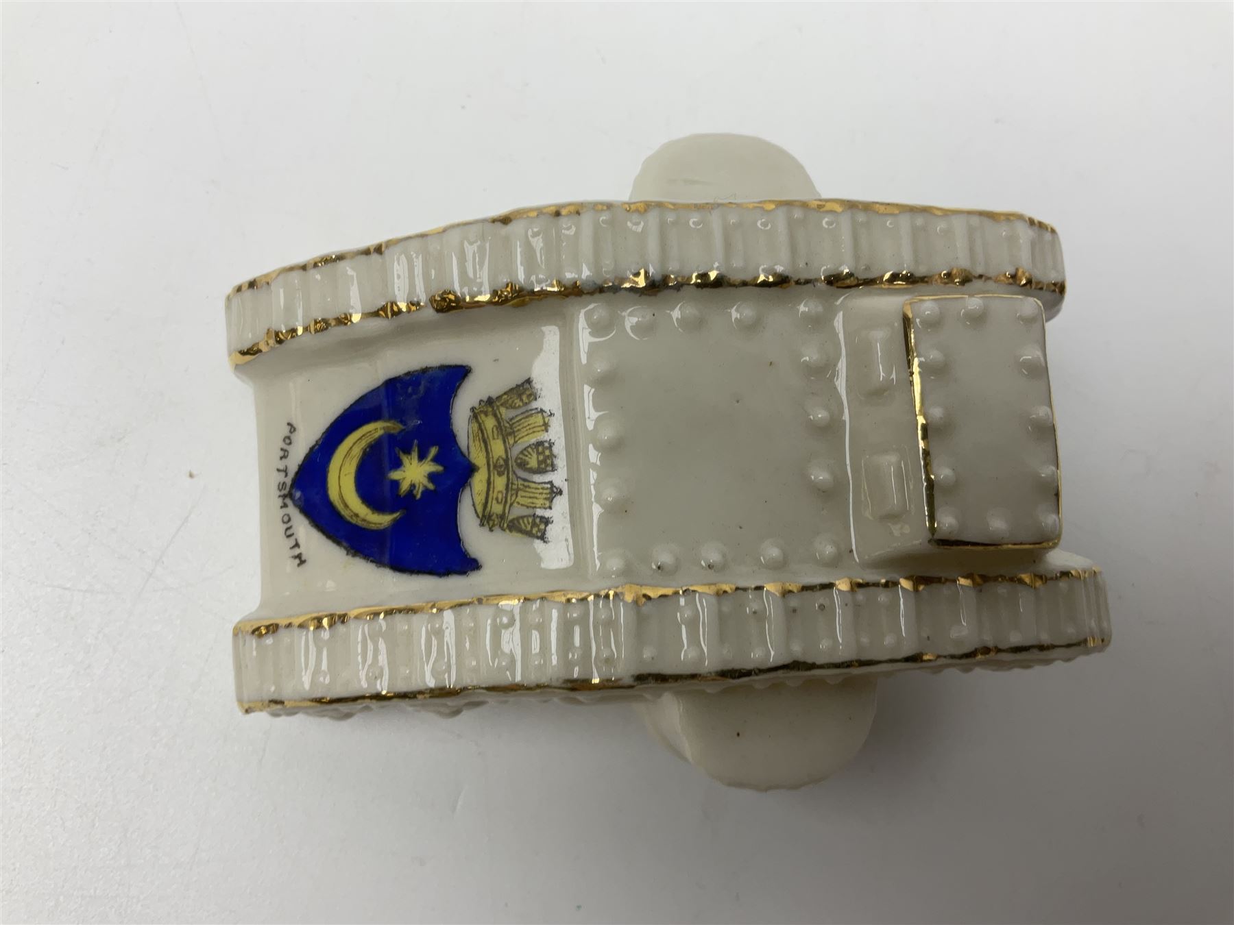 Ten WW1 crested china military models of tanks and field guns; various makers including Goss, Grafton China, Arcadian China, Savoy China etc; various crests including Portsmouth, Brighton, Pendleton, Paignton, Cowes, Flamborough etc (10)