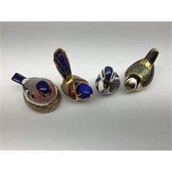 Four Royal Crown Derby paperweights, comprising Sitting Duckling, Fairy Wren, both with gold stoppers, Bullfinch Nesting and Blue Tit, both with silver stoppers 