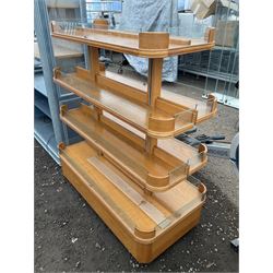 Light oak four tier centre display stand, rectangular form with curved corners, with raised glass sides - THIS LOT IS TO BE COLLECTED BY APPOINTMENT FROM DUGGLEBY STORAGE, GREAT HILL, EASTFIELD, SCARBOROUGH, YO11 3TX