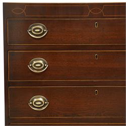 19th century Regency Revival inlaid mahogany chest, the plain rectangular top and frieze inlaid with geometric satinwood stringing, fitted with graduating long drawers fitted with pressed brass patera form handle-plates, on splayed feet with shaped apron