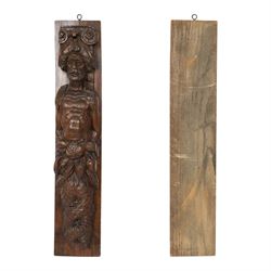 Pair of 17th century carved oak terms, each depicting a male figure in headpiece, with fish tail beneath fruits, 51.5cm