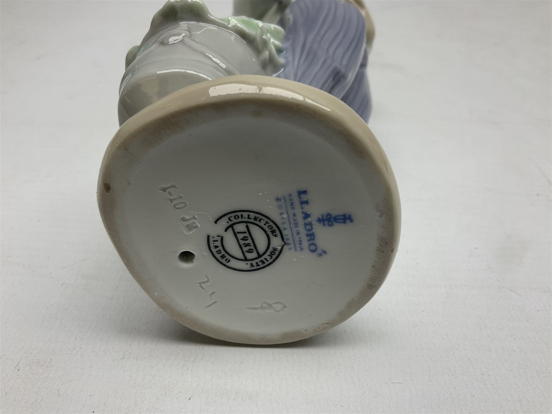 Six Lladro figures, comprising Naughty Dog no 4982, Best Friend 7620 and My Buddy no 7609, Kitty Confrontation no 1442, It Wasn't Me no 7672 and Rabbit Eating no 4772, three with original boxes, largest example H22cm