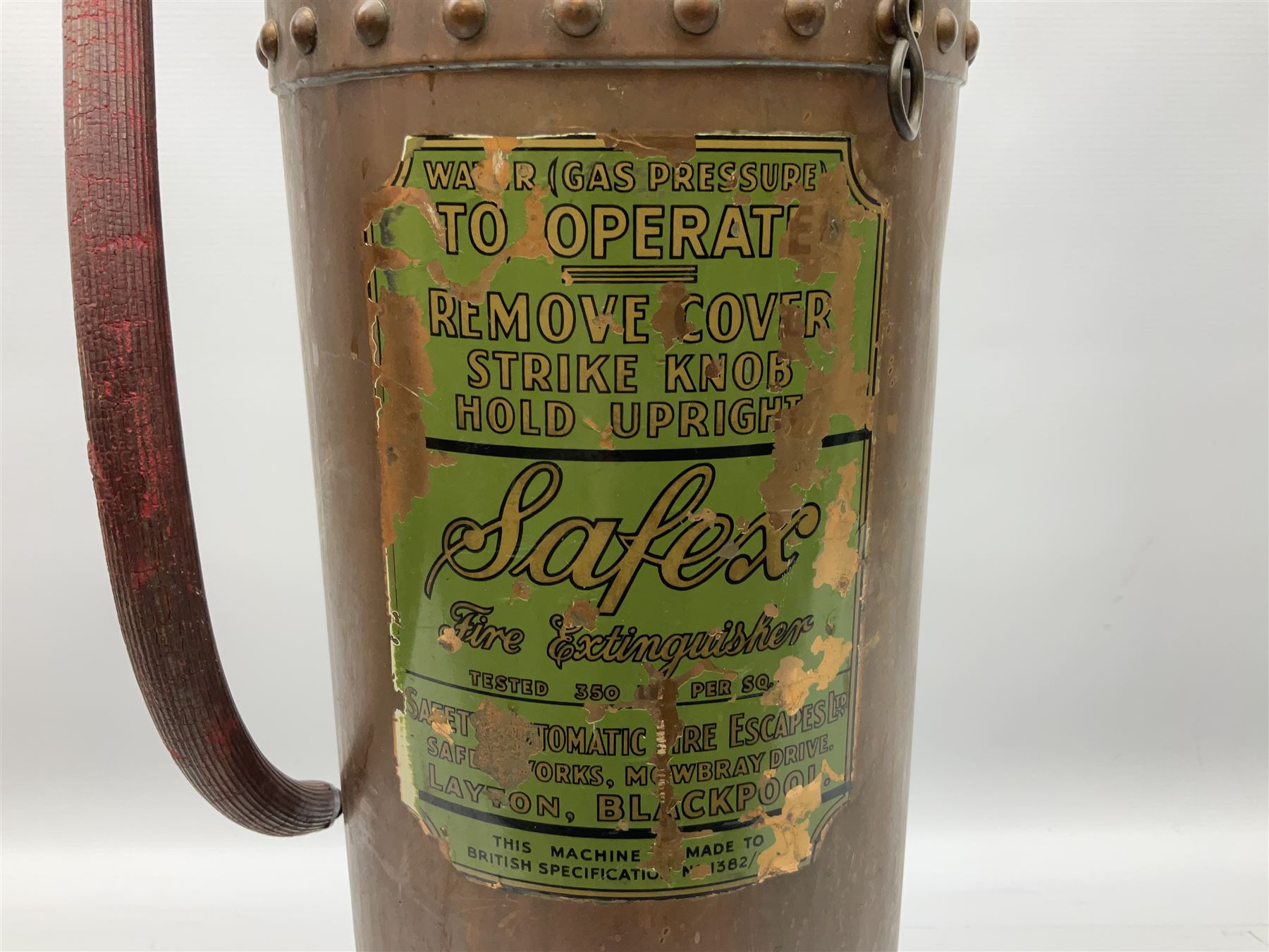 Large copper ‘Waterloo’ fire extinguisher by Read and Campbell Ltd and another Safex example 
