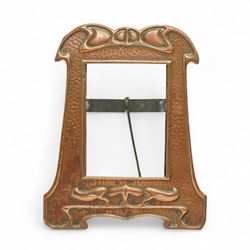 Newlyn type Arts and Crafts copper photograph frame decorated with a fish and galleon 24cm x 20cm with oval aperture and two other Newlyn style beaten copper frames (3)