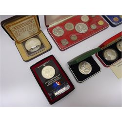 Coins and medallions, Commonwealth of the Bahama Islands 1972 proof set cased with certificate, First National Coinage of Barbados 1973 proof set cased with certificate, Royal Mint 1977 silver proof crown cased without certificate, Commonwealth of the Bahamas 1978 ten dollar silver coin cased with certificate, 'The Government of St Helena and Ascension Island Royal Visit Silver Proof Fifty Pence Coin Collection 1984' cased with certificate, United States 1984 silver dollar on card of issue, National Trust medallion in green case and a Silver Jubilee 'Vivat Regina 1952 1977' hallmarked silver medallion in a Royal Mint case