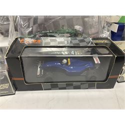 Panini Formula 1 The Car Collection - twelve die-cast models including ten in unopened packaging with periodical; all models in plastic display boxes; and eight other boxed die-cast models of racing cars by Corgi, Onyx, Classico, Minichamps etc (20)