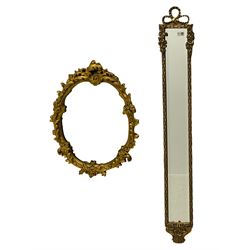 Narrow gilt ribbon mirror, and an oval ornate wall mirror