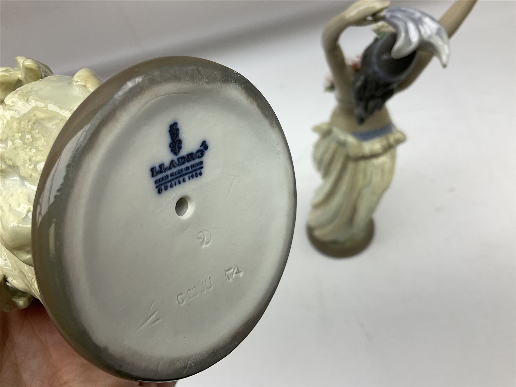 Two Lladro figures, comprising Momi no 1529 and Mahlia no 1531, both with original boxes, both year issued 1987, year retired 1989, largest example H29cm