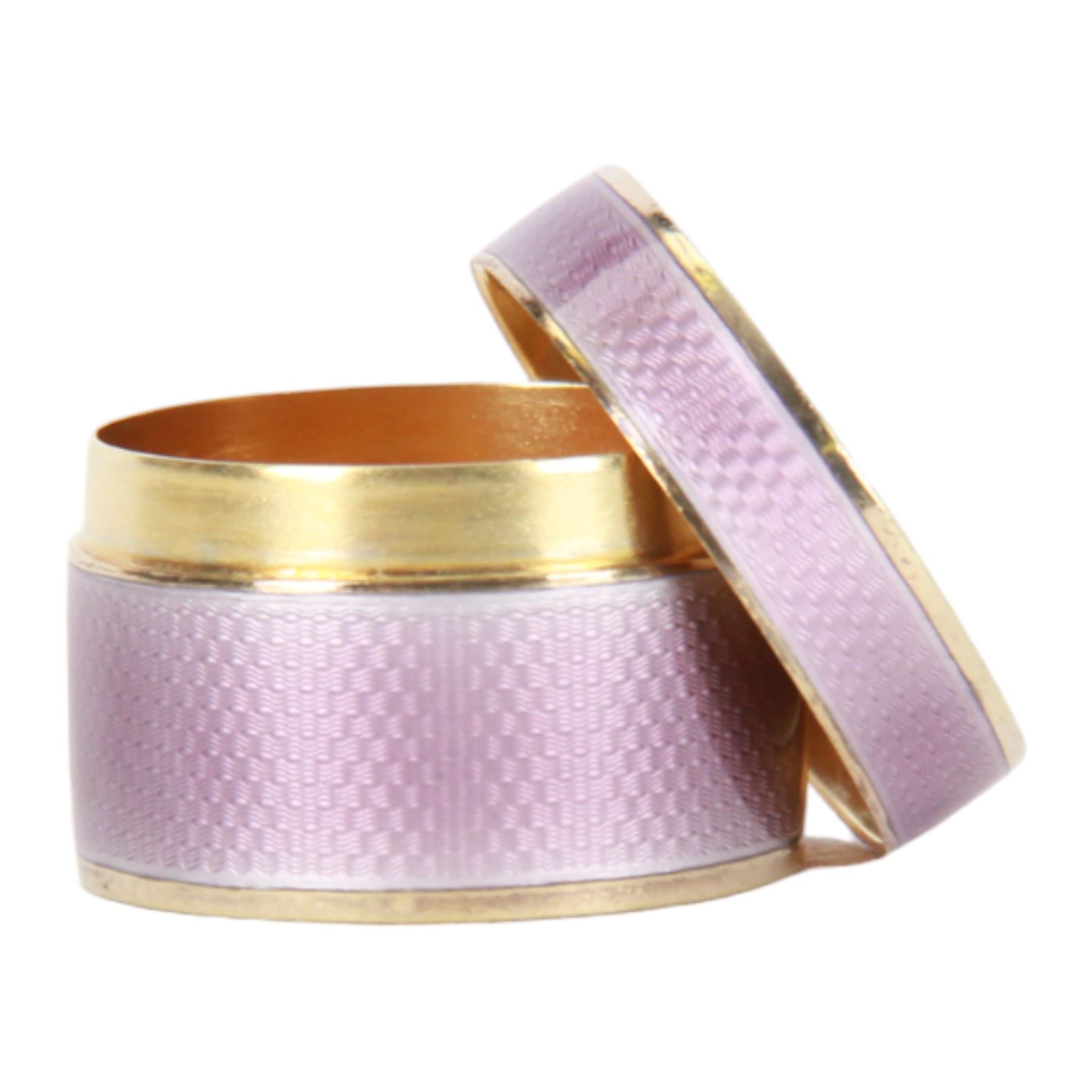 Small early 20th century silver gilt and lilac guilloche enamel box, of cylindrical form, the cover lifting to reveal a gilt interior, hallmarked Asprey & Co Ltd, London 1910, H2.5cm D4cm
