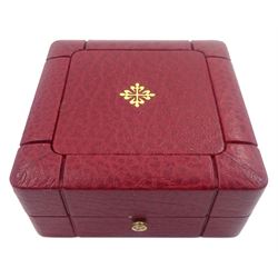 Pair of Patek Philippe Nautilus 18ct yellow gold and diamond cufflinks, with sapphire crystal, black-grey centre and diamond-set front, hallmarked, in original box