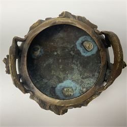 Chinese cast brass censer, with applied dragon twin handles and decoration, raised upon three feet with character mark beneath, D12cm H9.5cm