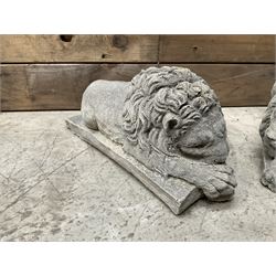 Pair of small cast stone sleeping Trafalgar Lions