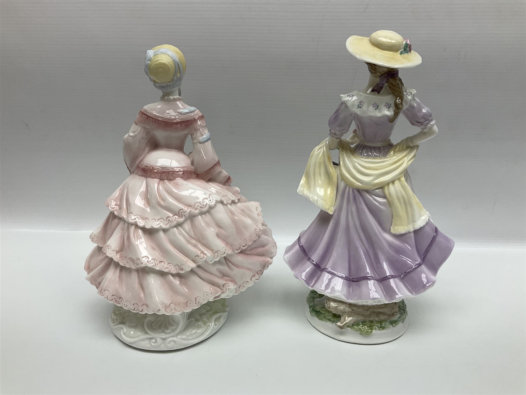 Three Coalport figures, comprising Eugenie, Lillie Langtry and Laura, together with seven other similar figures