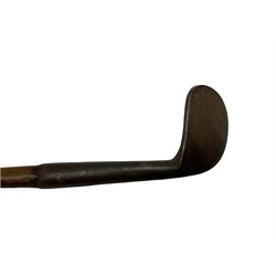 Golf - late 19th century unmarked smooth faced rut or track iron with hickory shaft L101cm