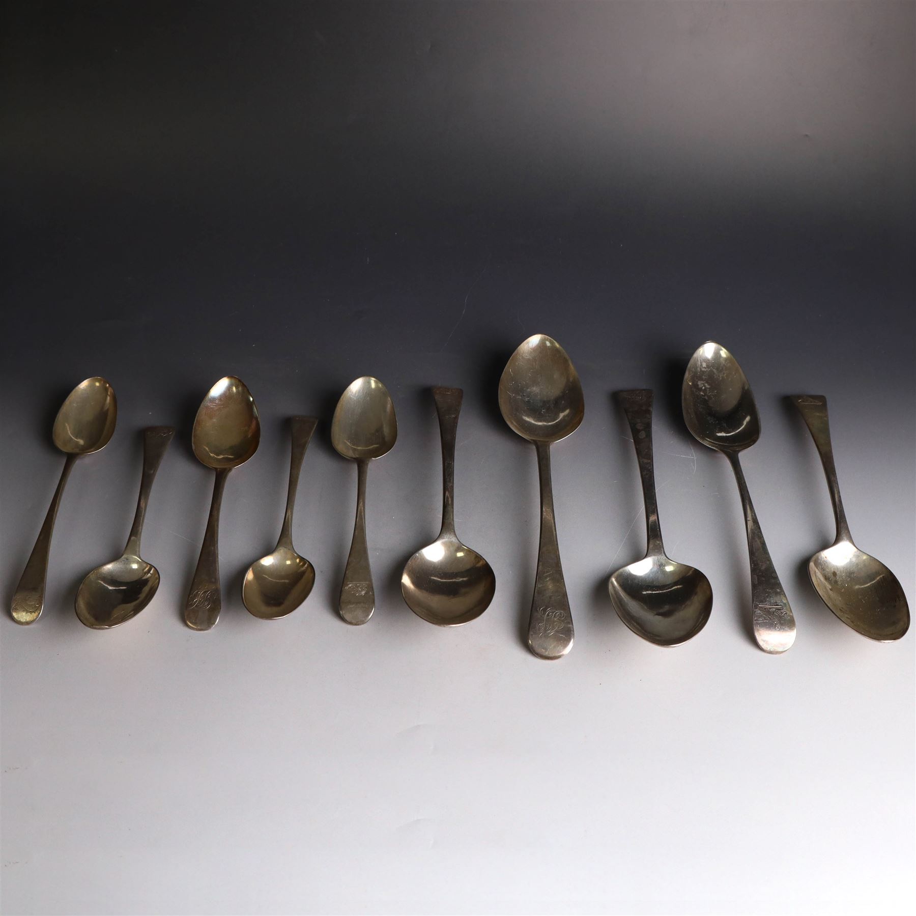 Ten Georgian and later silver table and dessert spoons, including pair of George III Old English pattern examples, engraved with fish to terminal, hallmarked London 1791, maker's mark ID and a pair of George III Old English pattern table spoons with engraved bird to terminal, George Smith (III) & William Fearn, London 1786