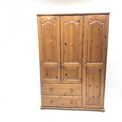Large solid pine combination triple wardrobe, shaped moulded projecting cornice, three doors, two drawers, bun feet, W130cm, H183cm, D60cm