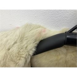 Brown mid length musquash fur coat by National Fur Company together with white rabbit cape
