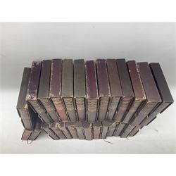 The Works of Sir Walter Scott. Twenty-seven volumes. 1930s. Uniformly bound in maroon/gilt with gilt top edges and matching slip cases.