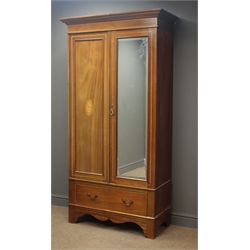  Small Edwardian inlaid mahogany wardrobe, projecting cornice, single mirrored door above single drawer, shaped apron, stile supports, W101cm, H194cm, D47cm  