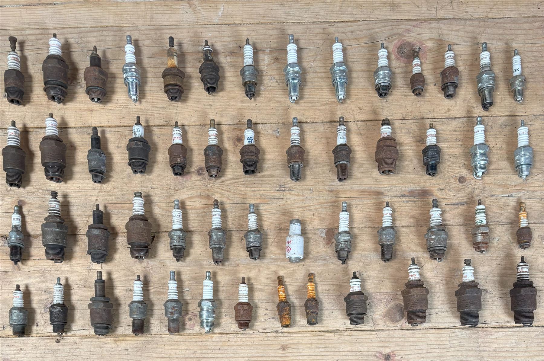 Group of collectable spark plugs, mostly used, mainly by Champion, and some earlier examples by K.L.G.  - COLLECTION BY APPOINTMENT FROM: The White House, Thirsk Road, Easingwold, York, YO61 3NF - CALL 01723 507111 TO ARRANGE